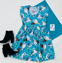 King Of The Bush Sundress Aqua Background