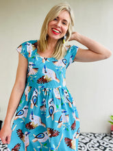 King Of The Bush Sundress Aqua Background