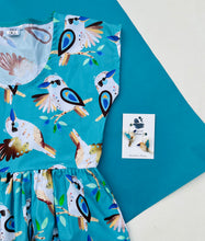 King Of The Bush Sundress Aqua Background
