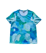 Blue and green patterned t-shirt on a white background