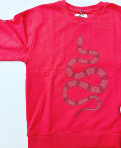 Snakes Alive sweater - coral melon
